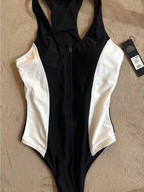 Fashion Nova Black and White Zip Front One-Piece Swimsuit